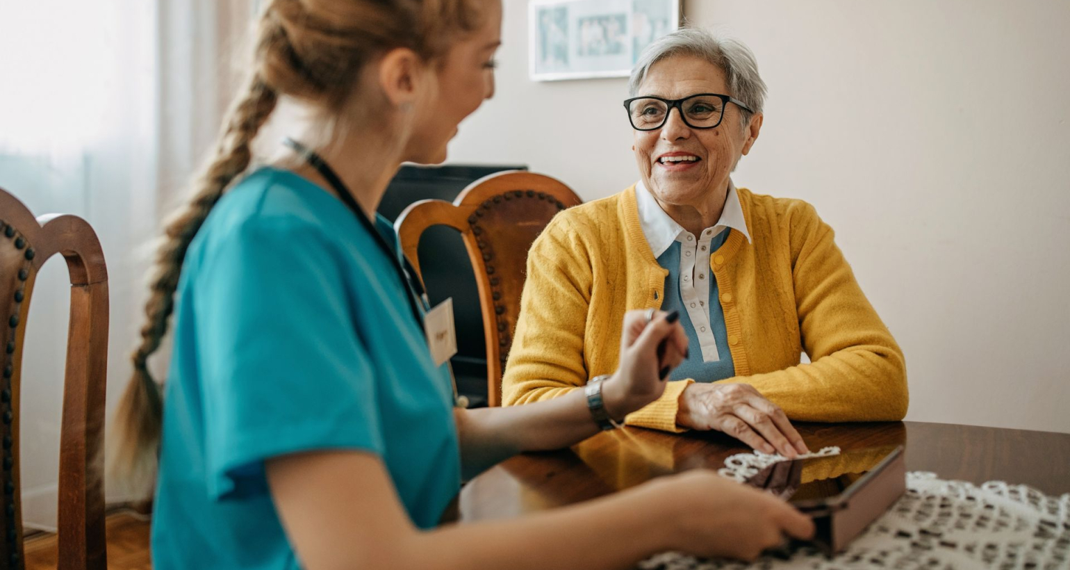 home health aide with elderly woman